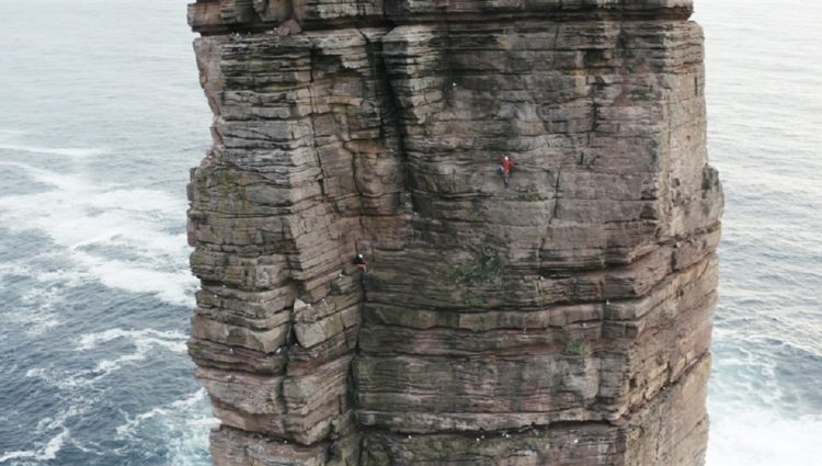 Photo of Jesse Dufton climbing the ‘Old Man of Hoy’
