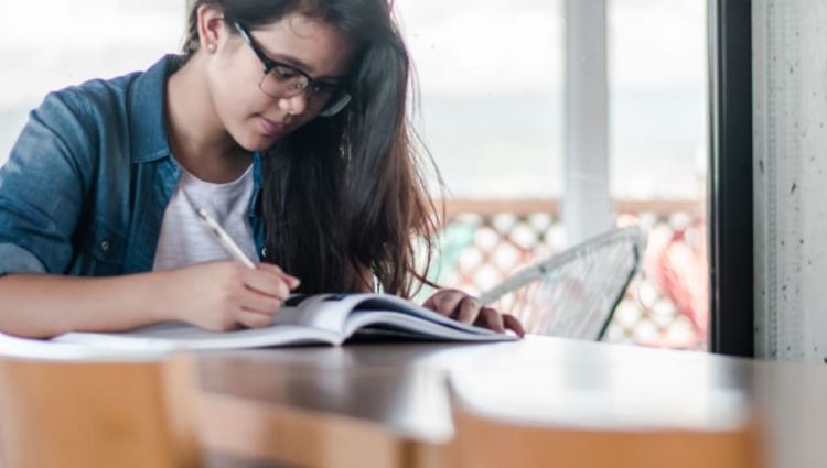 Photo of student making notes