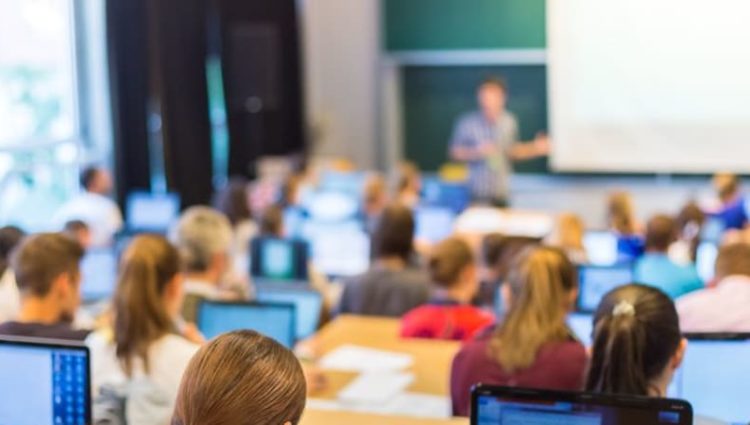 Photo of students in lecture hall.