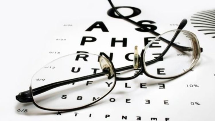 Photo of sight chart and glasses