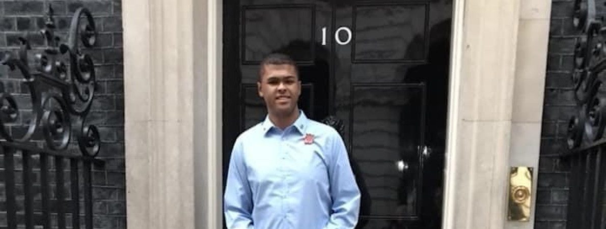 Rainbow standing outside of 10 Downing Street