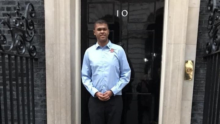 Rainbow standing outside of 10 Downing Street