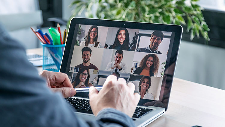 Man on a video call with colleagues | links to article: Working from home: tips and advice during lockdown
