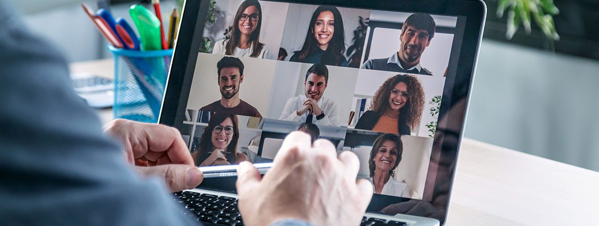 Man on a video conferencing call with colleagues