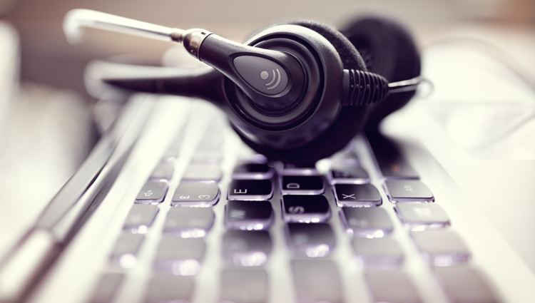 Headphones on a computer keyboard