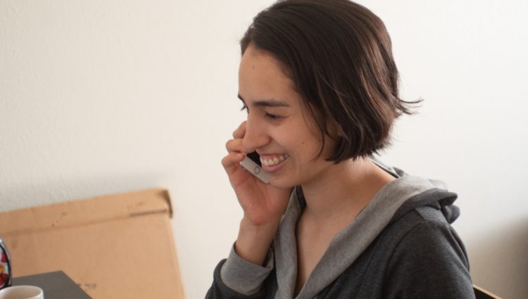 Close up of a woman talking on the phone