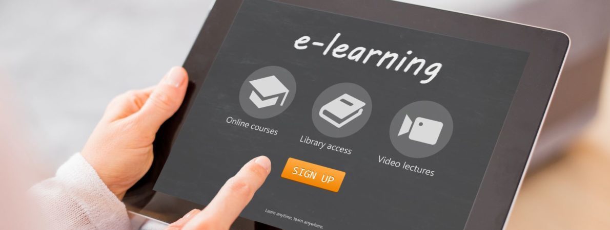 tablet with e-learning, icons and login on screen