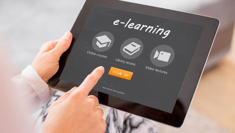 tablet with e-learning, icons and login on screen