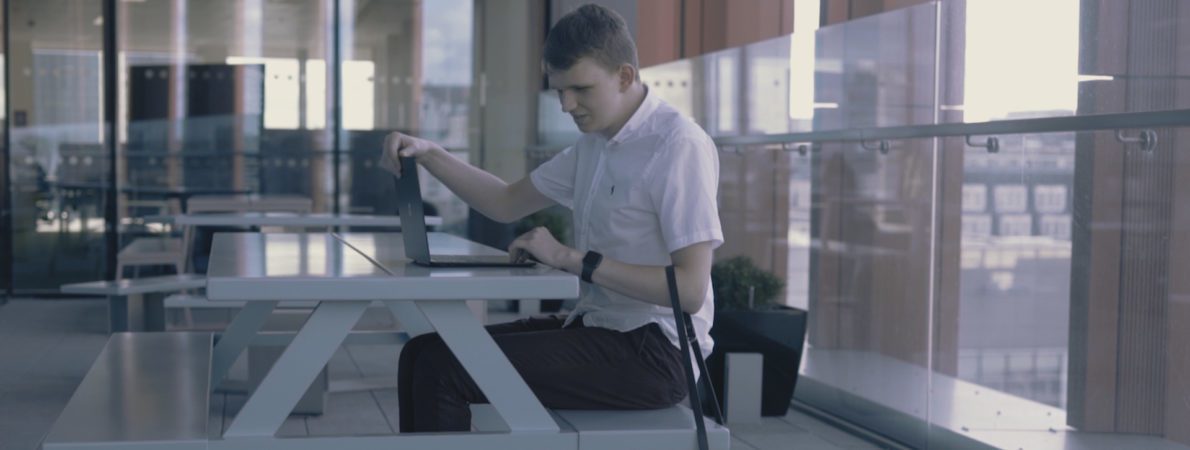 Callum working on laptop