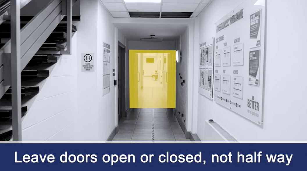 Still from the training video advising doors should not be left half-open