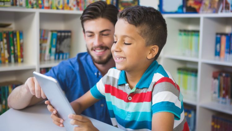 Teacher and child on iPad