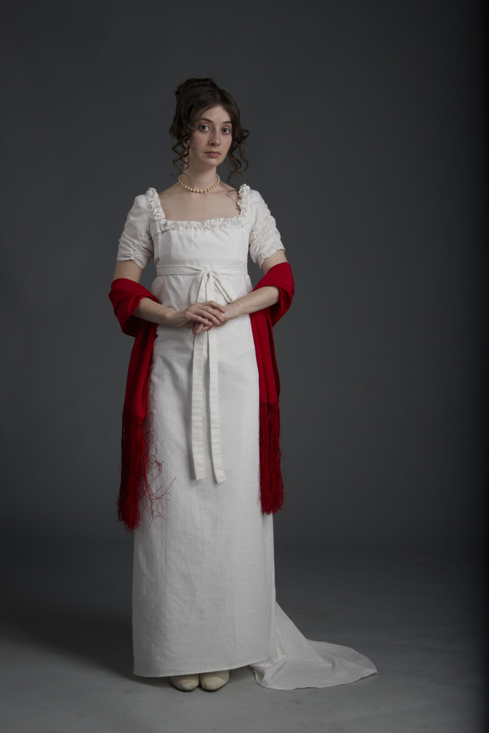 A full picture of the white dress Rowan made worn by a woman