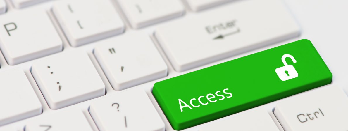 Close-up of a keyboard with an 'Access' key in green