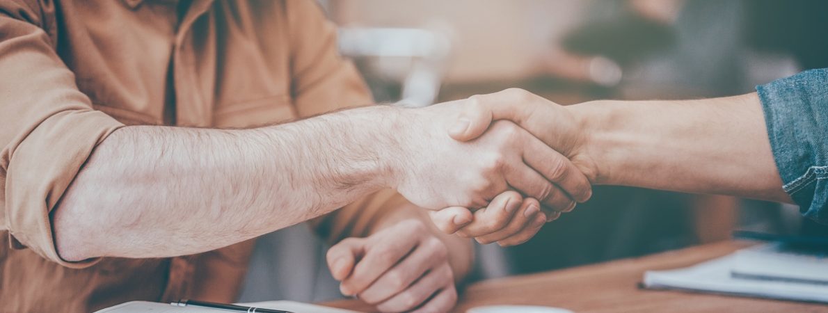 Picture of two people shaking hands