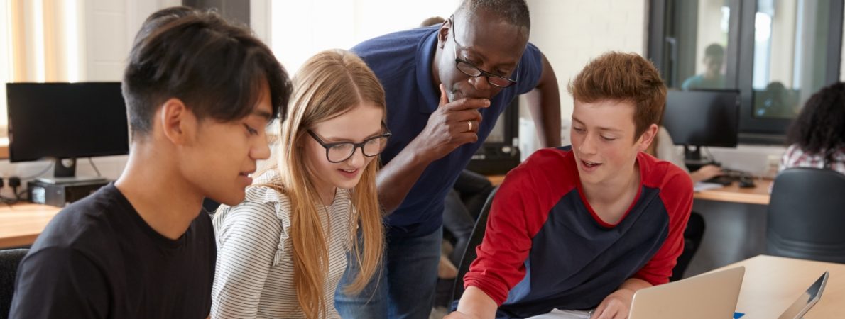 Group of 3 Design Students With Teacher Working In CAD3D Printing Lab Shutterstock 2024 lr