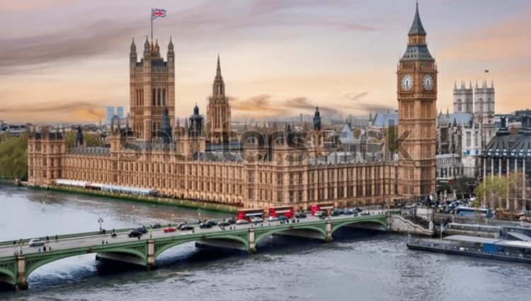 A picture of the House of Parliament overlooking the river Thames and a bridge. | links to article: Parliament Welcomes the Access and Assistance for All Champions