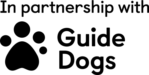 An image of the sentence "In partnership with Guide Dogs" with the Guide Dogs logo of a paw print