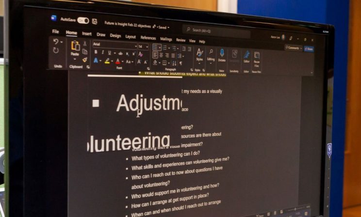 Man using assistive technology in the workplace